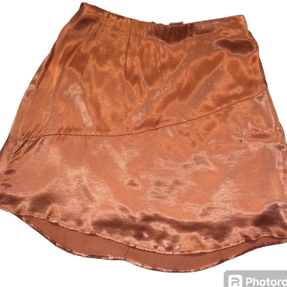 Peach Satin Mini Skirt with Soft Silky Feel Size S Price Firm